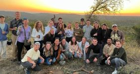 group photo of local staff and international volunteers in Africa