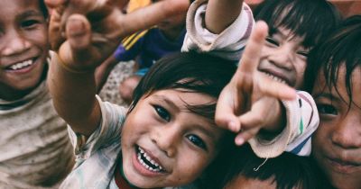 kids smiling on an affordable volunteer program