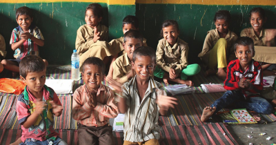 Classroom full of students smiling