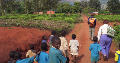 Local children running down road, Peace Corps in Malawi