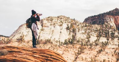 A photographer on top of a mountain