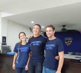 Three people wearing Maximo Nivel shirts