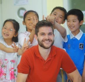 a TEFL teacher with his students