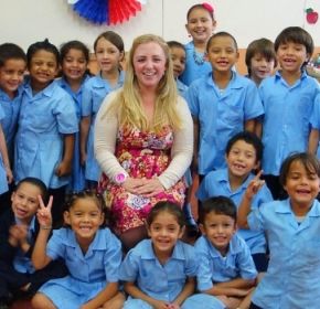 a female teacher in Costa Rica with her students