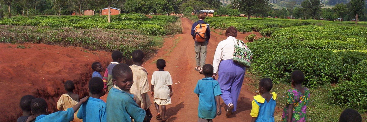 Local children running down road, Peace Corps in Malawi