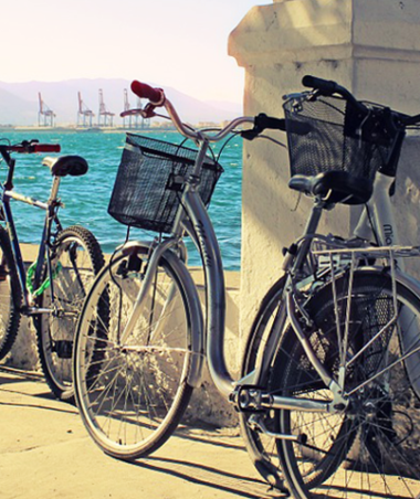 Biking along the Malaga harbor in Spain