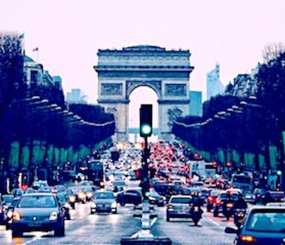 a busy street near the Arc de Triomphe in Paris 