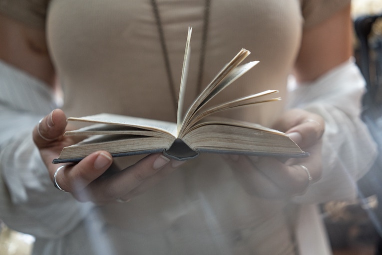 person holding open book
