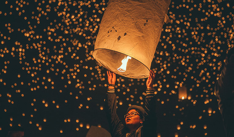 woman at lantern festival in Thailand