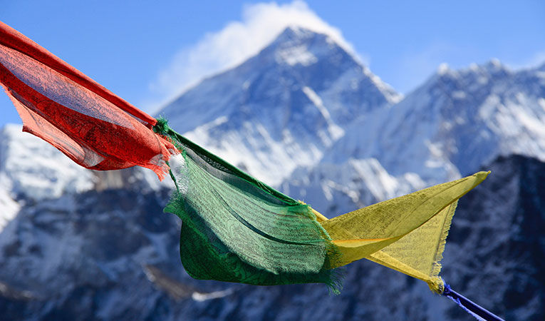 Colors of Nepal flag against white mountain