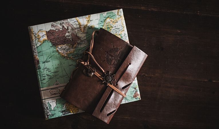 Travel journals on table