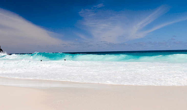 Crystal blue waves in the Seychelles