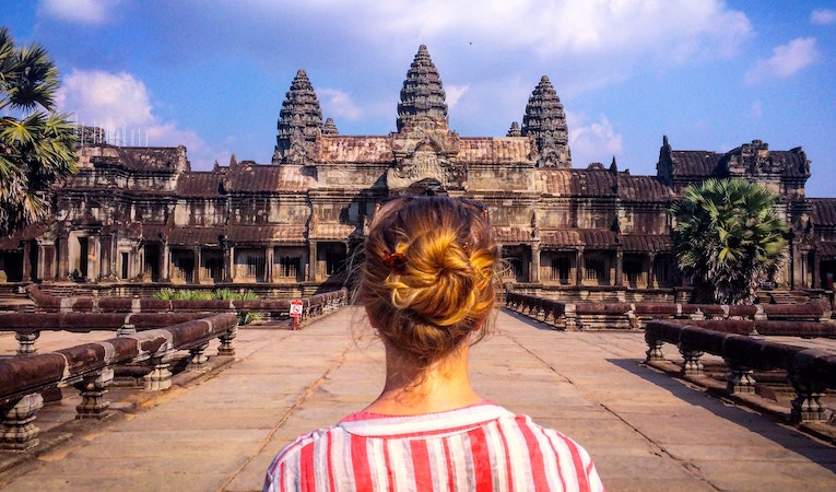 traveler visiting angkor wat in siem reap cambodia