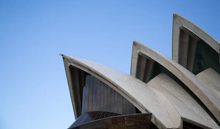 Detail shot, close up of Sydney Opera House roof against blue sky
