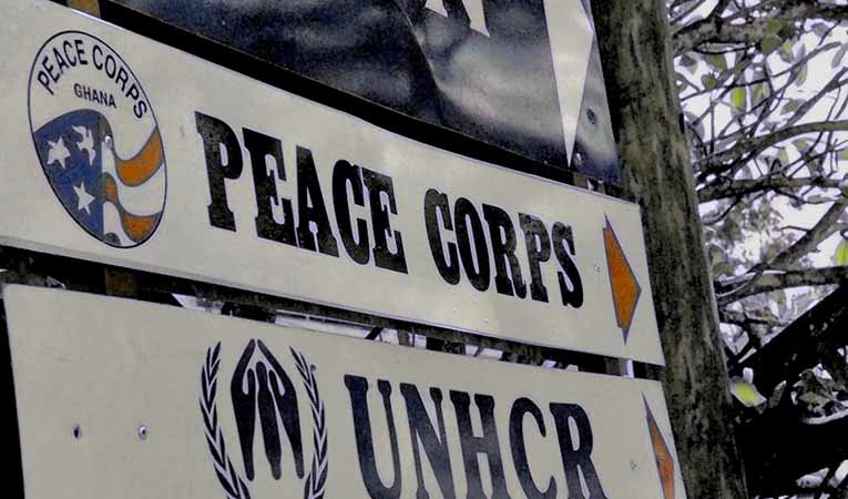 Peace Corps and UNHCR signs in Ghana