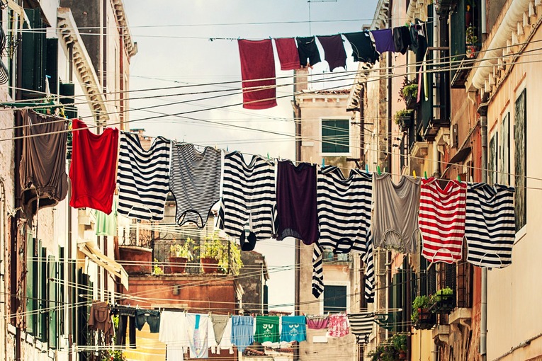 Clothes hanging on street in Venice