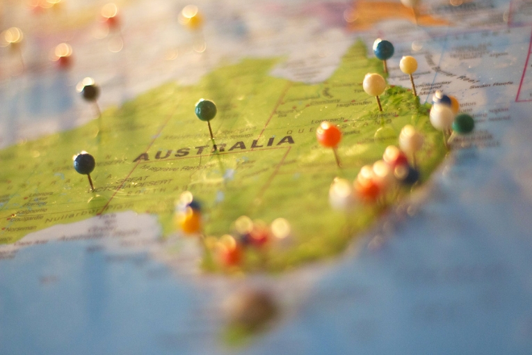 a colorful map of australia full of push pins