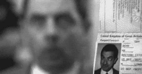 Mr. Beans making a different face to match his passport photo GIF