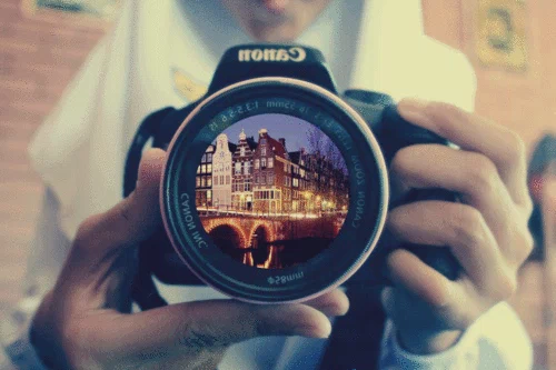 Changing camera lens GIF that shows different country landmarks