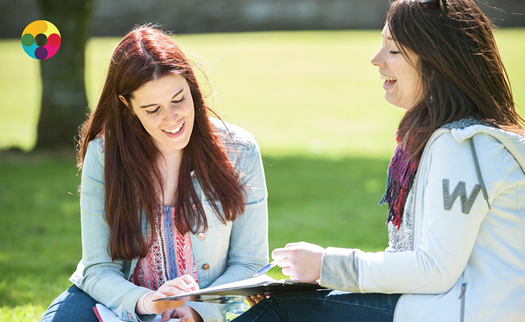 Girls talking in a park