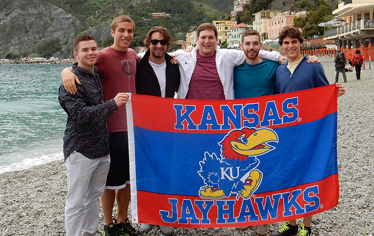Kansas Jayhawks players out in the beach