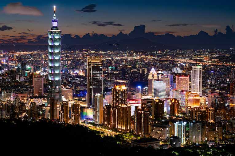 city skyline lit up at night